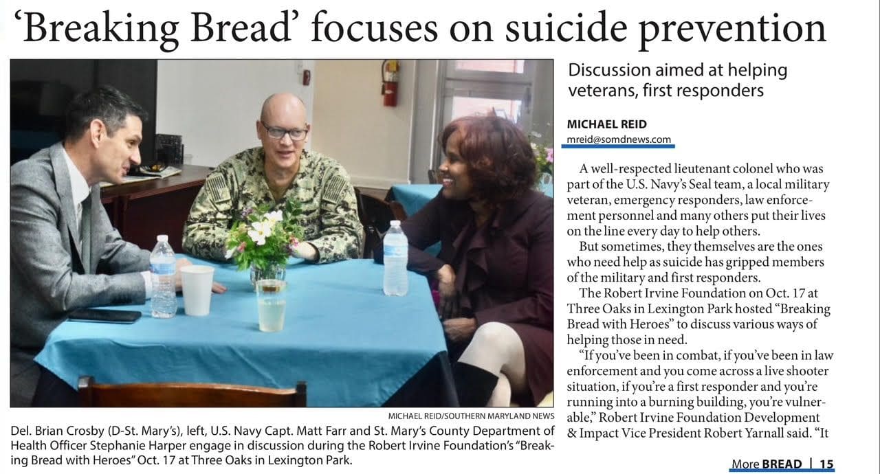 US Navy Capt. Kuffler discusses suicide prevention with a survivor at a Navy hospital.